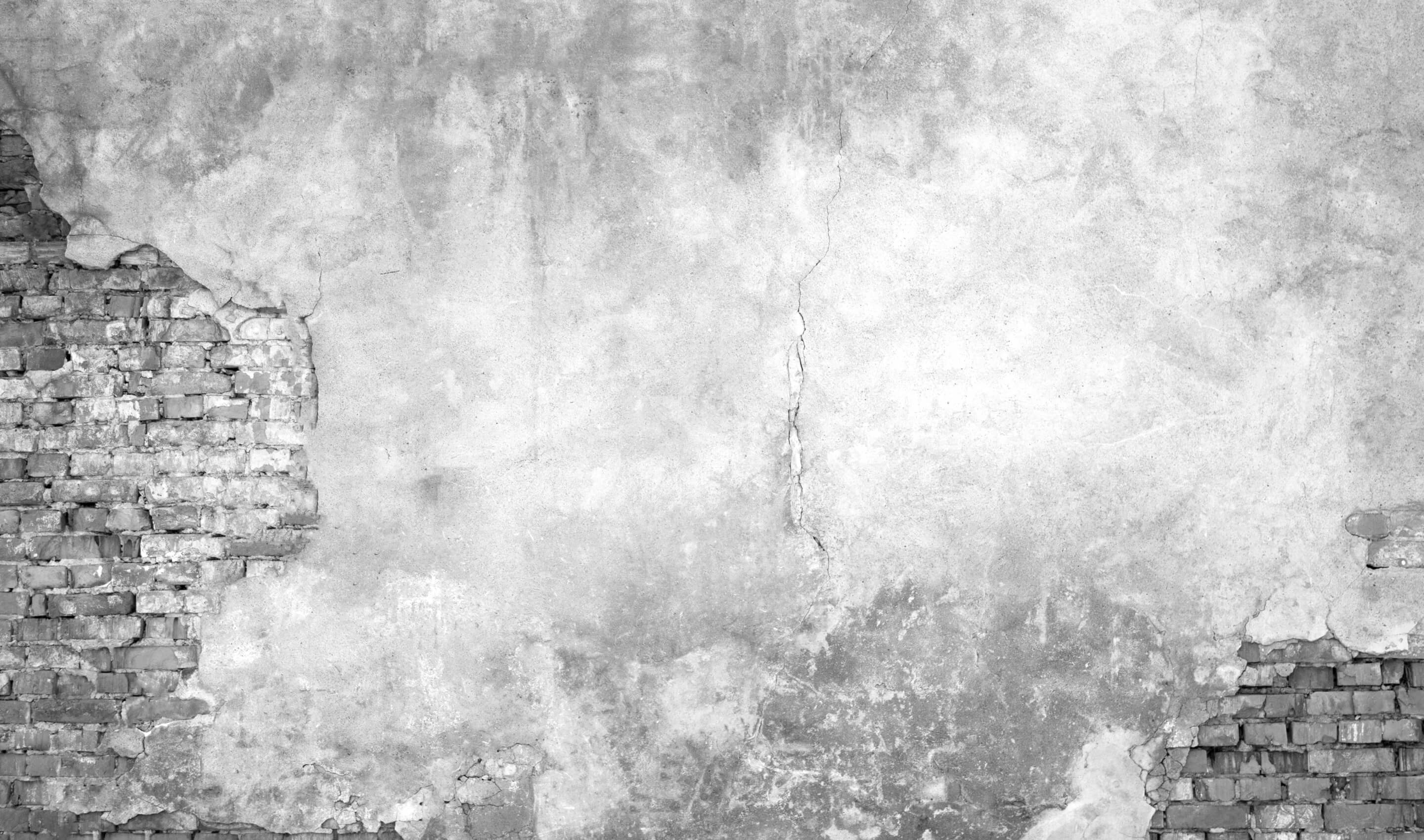 Ein schwarz-weißes Abbild eine Mauer